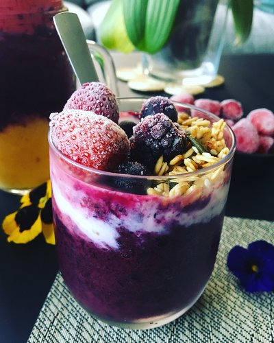 Blueberry smoothie, coconut yogurt, granola, strawberries