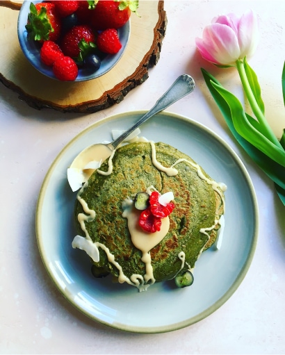 Matcha Pancakes with almond butter and mixed berries